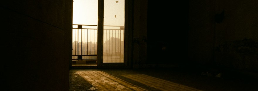 Light at a wooden door